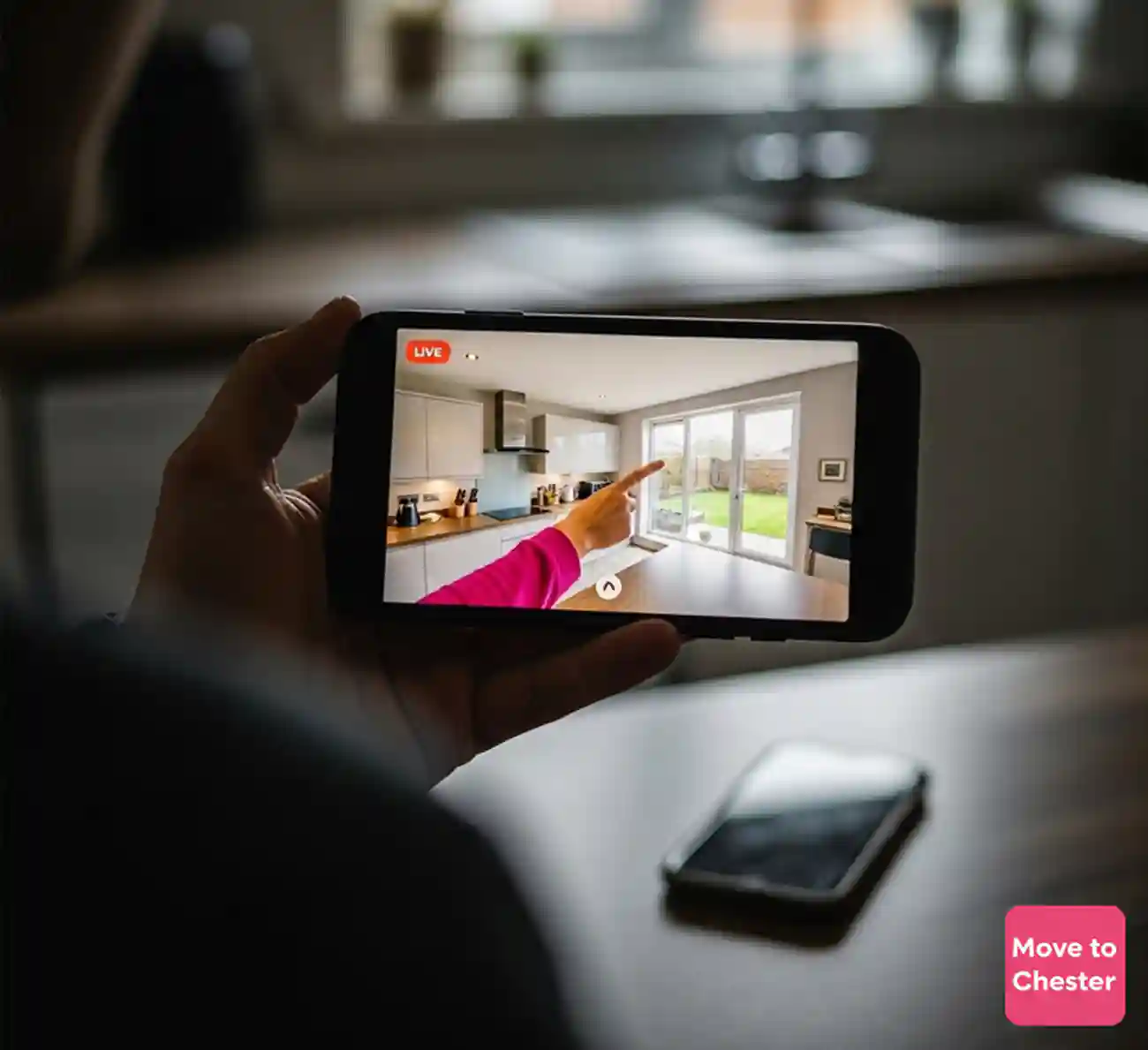 Remote buyer on video call reviewing professional property viewing report with specialist